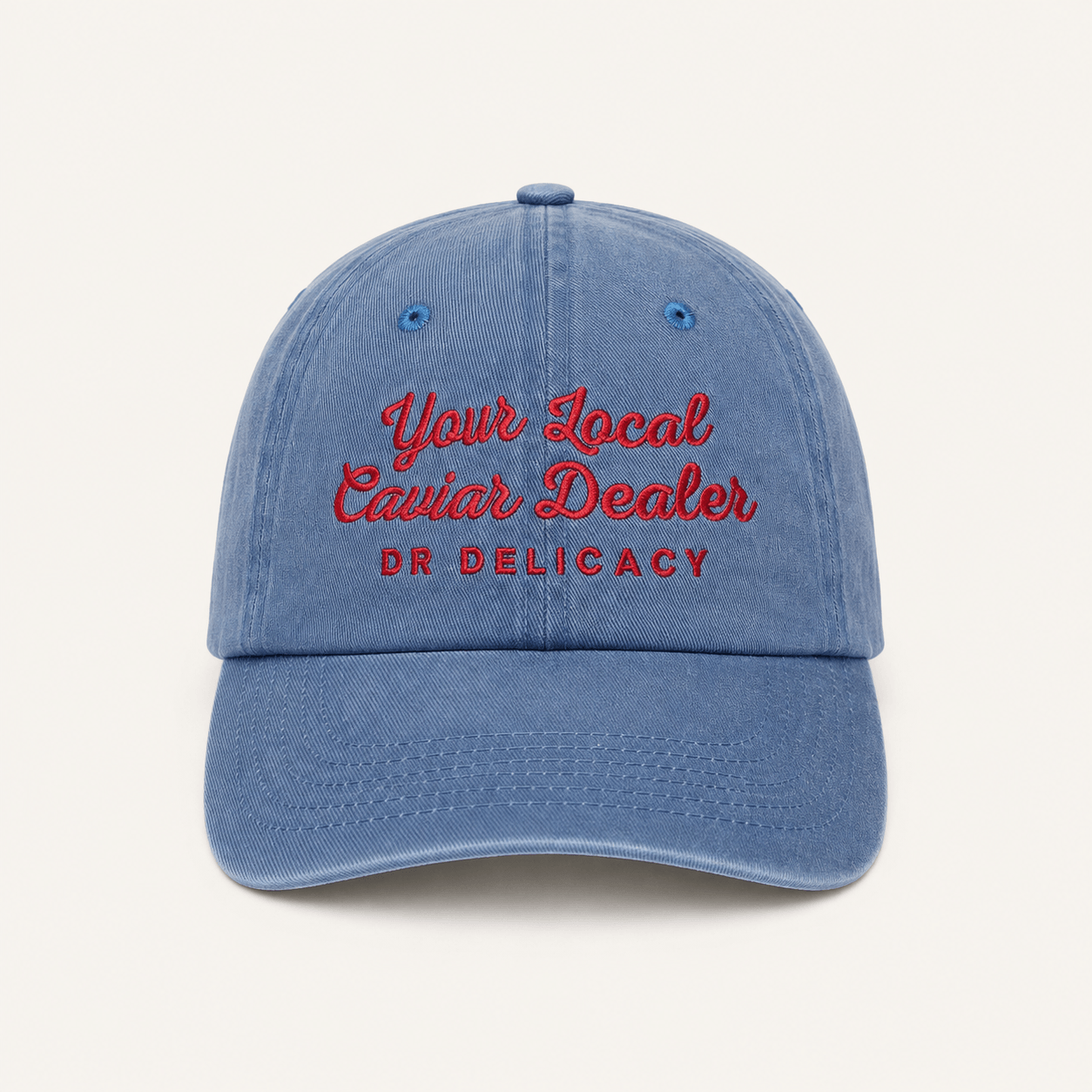 Caviar Embroidered Hat in washed blue featuring 'Your Local Caviar Dealer' red embroidery, made from 100% cotton.