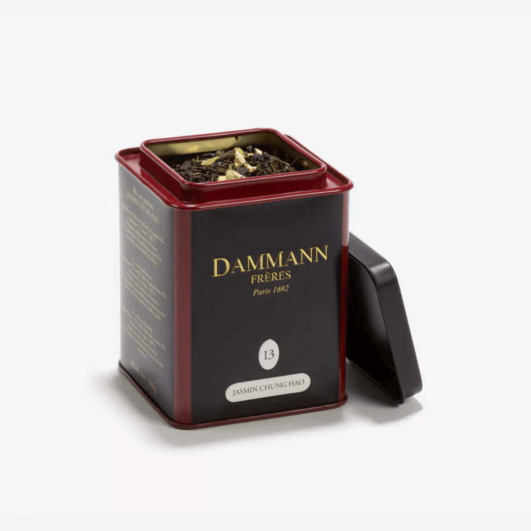 Damman Freres Jasmine Tea tin with loose tea leaves, showcasing the elegant packaging from Damman Frères.
