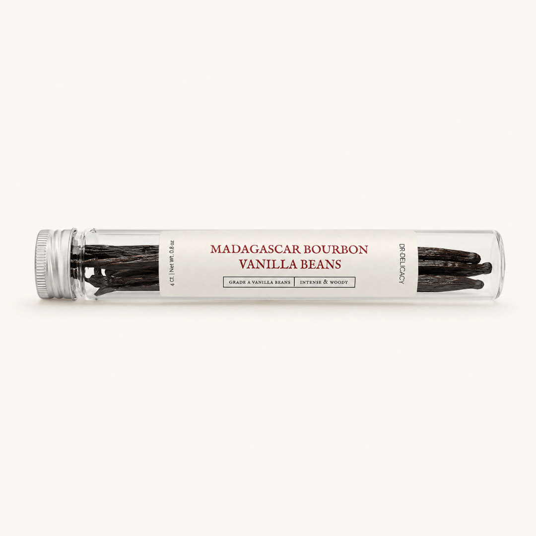 Grade A Madagascar Bourbon Vanilla Beans in a glass jar, showcasing rich, woody aroma and complex flavor.