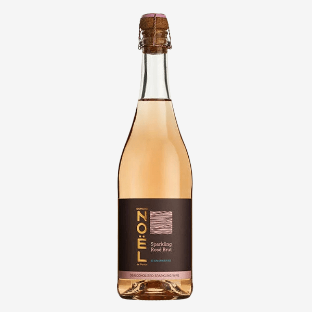 Domaine Noel Sparkling Rosé (Alcohol-free) bottle showcasing elegant pink liquid and festive label design.