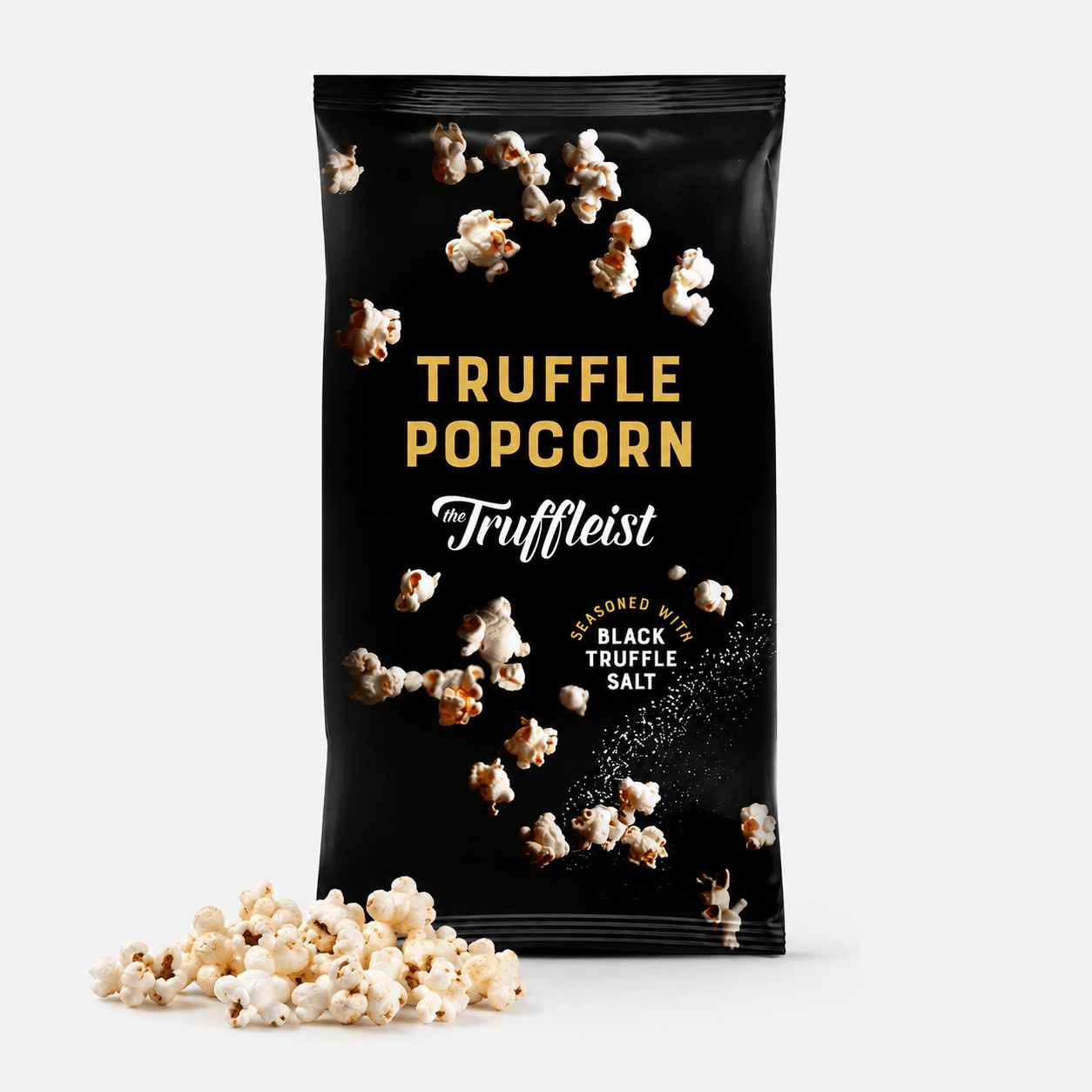 Truffle Popcorn bag featuring black truffle salt and popcorn pieces for a gourmet snack experience.