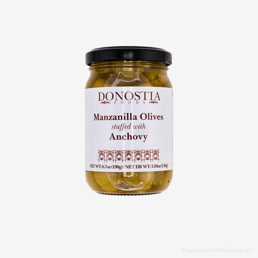 Manzanilla Stuffed Olives in a jar, featuring premium anchovy filling from southern Spain.