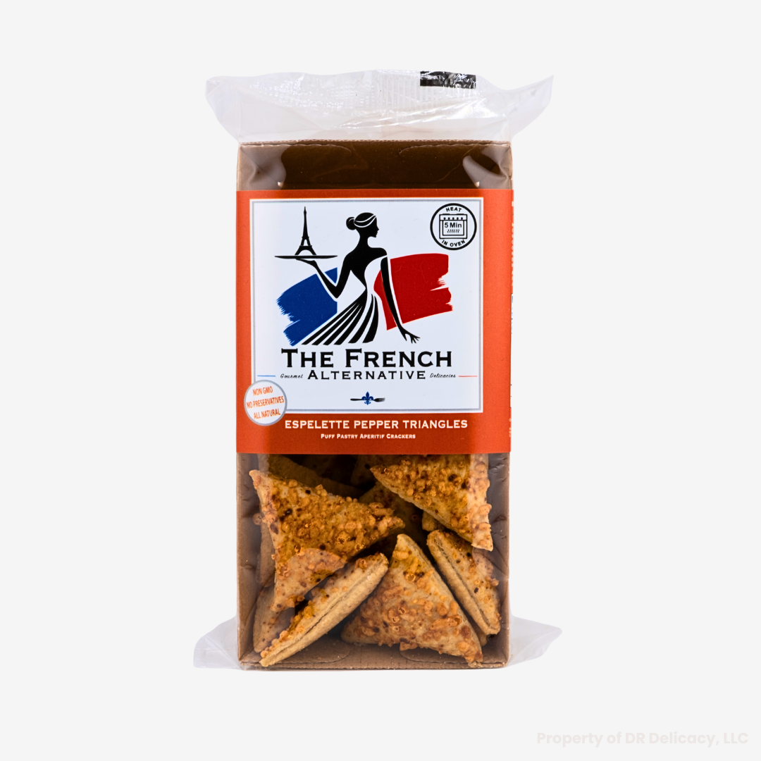 Emmental & Espelette Pepper Triangle Crackers in a decorative package with a French theme.