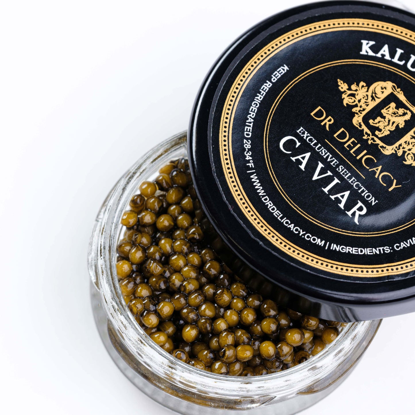 Kaluga Gold caviar in glass jar with black label, showcasing rich golden pearls ready for gourmet enjoyment.