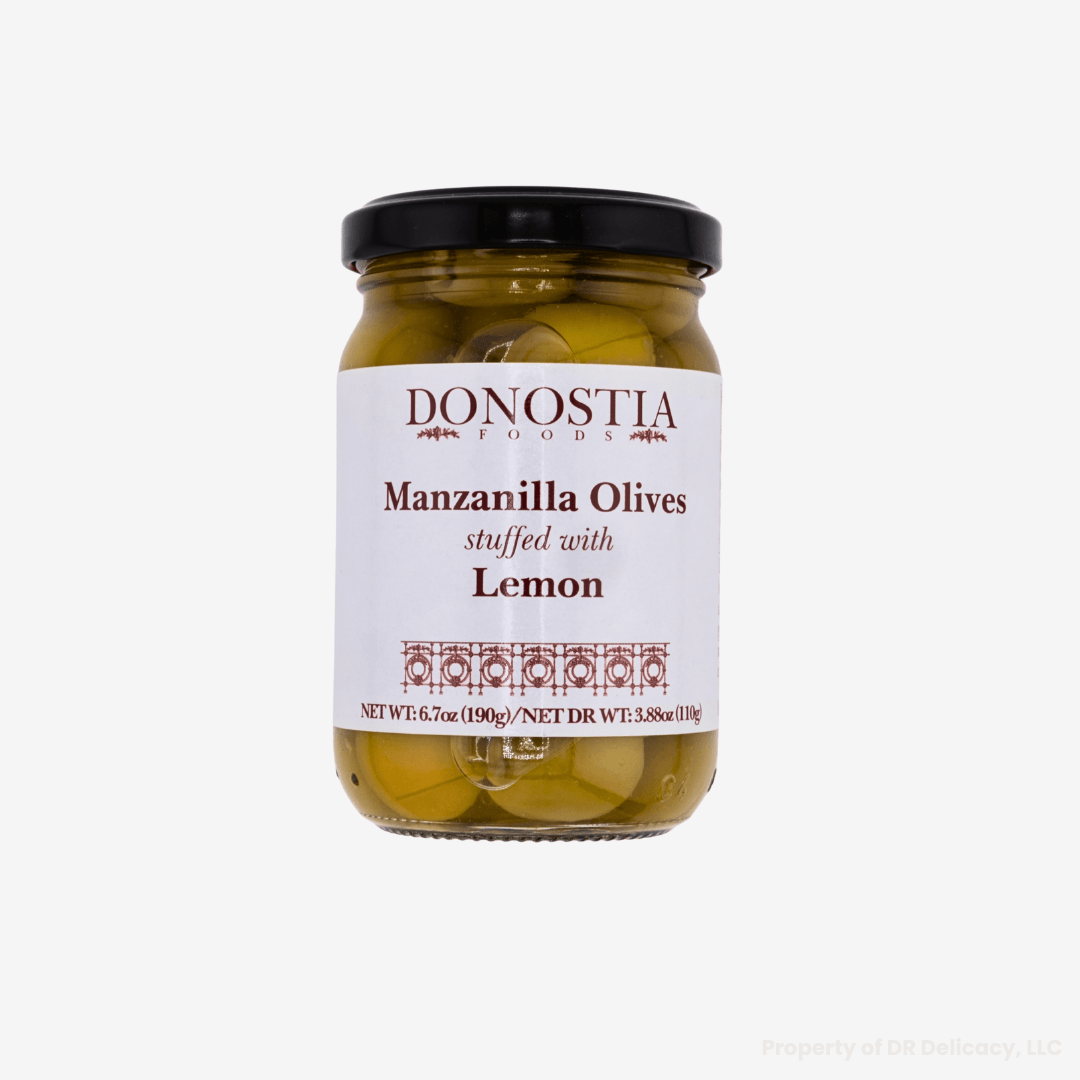 Manzanilla Stuffed Olives jar with lemon flavor showcasing premium quality olives from Spain.