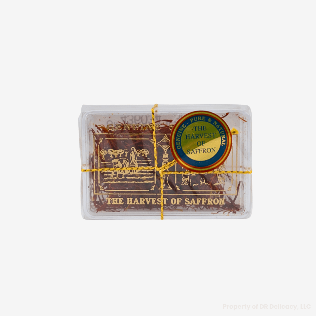 Spanish Saffron packaging with decorative label and vibrant saffron threads inside.