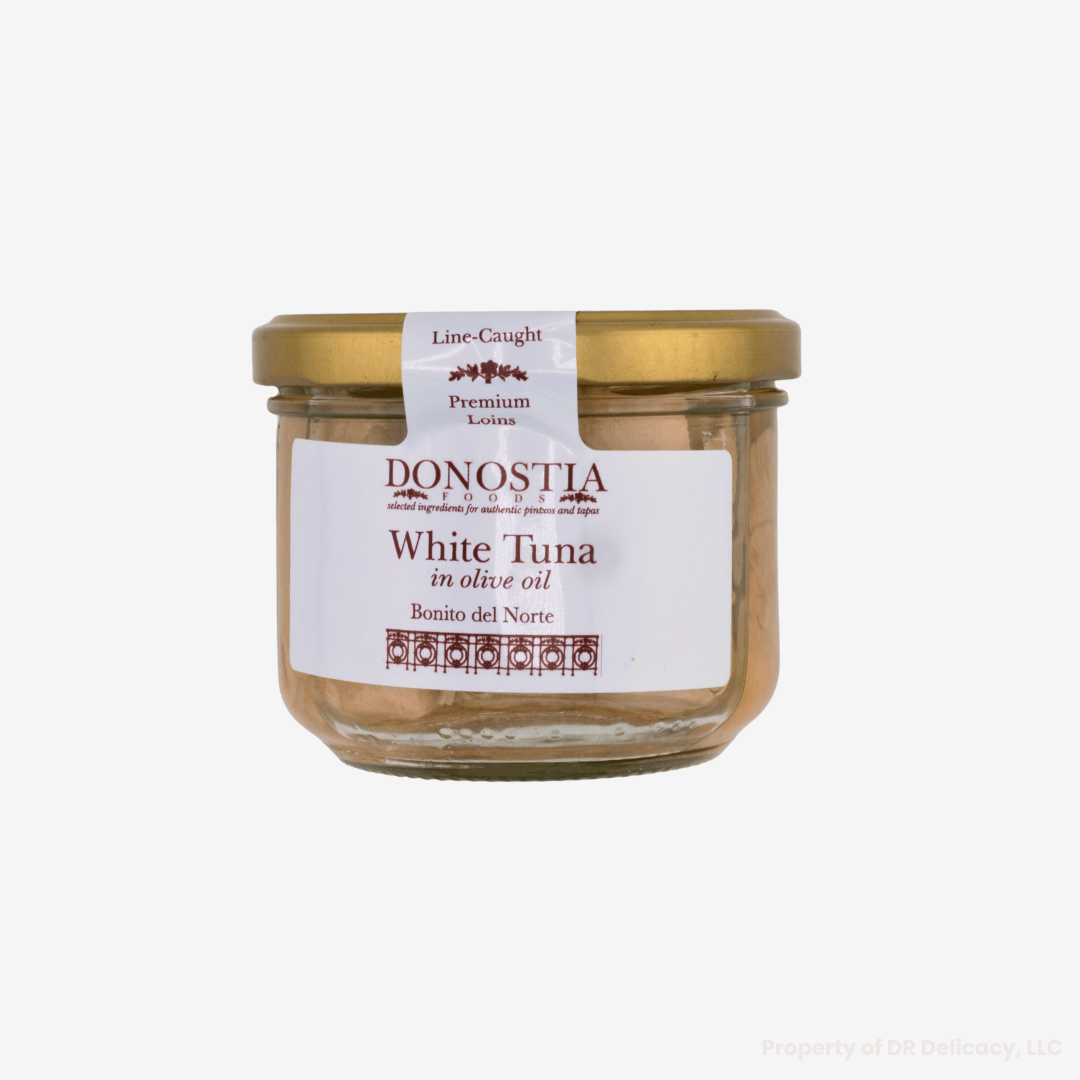 Donostia White Tuna in Olive Oil jar showcasing premium line-caught loins, perfect for gourmet dishes.