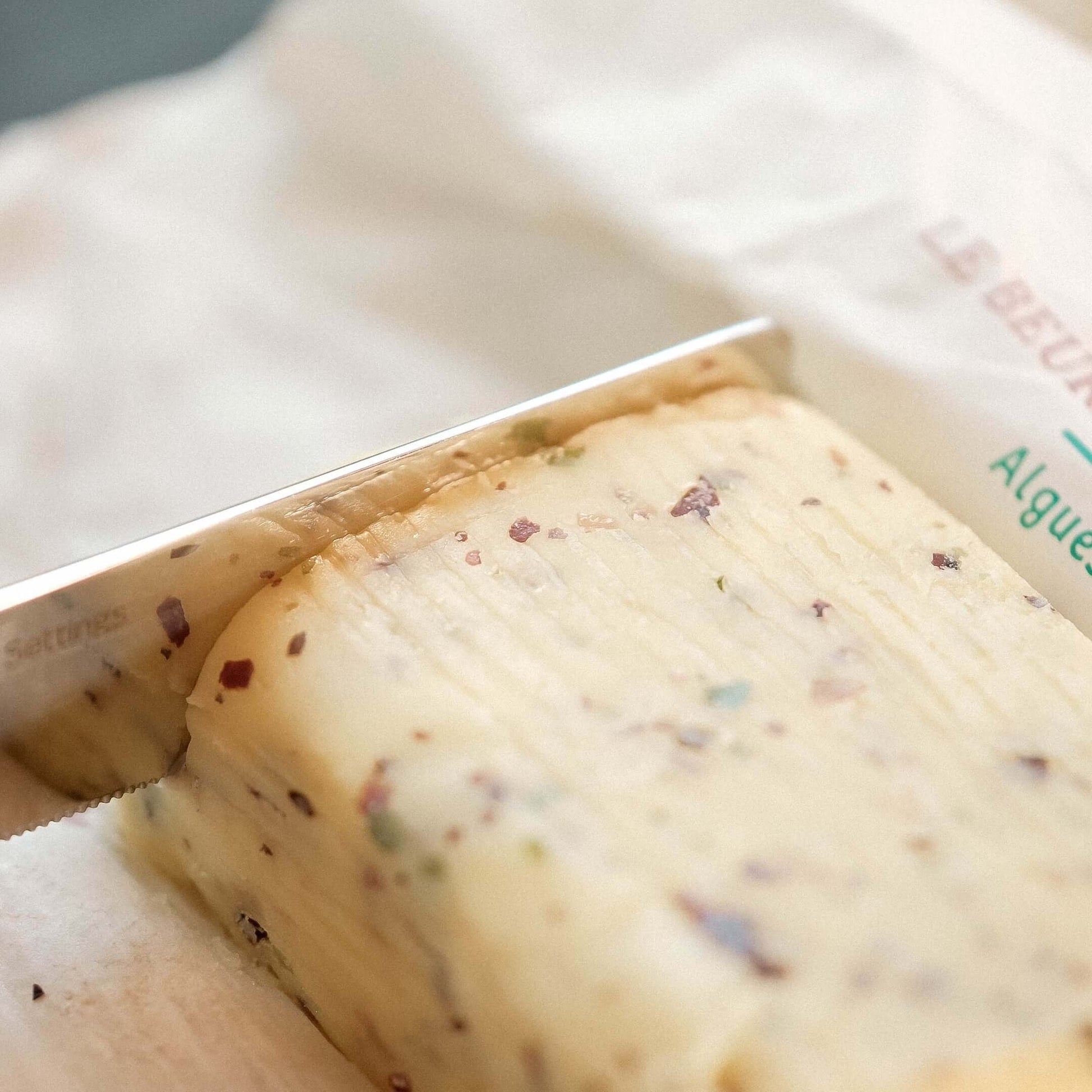 Le Beurre Bordier Seaweed Butter with sprinkled seaweed, perfect for seafood dishes and gourmet spreads.