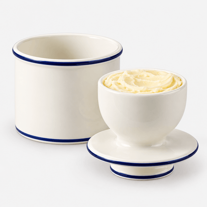 Butter Bell Crock – Le Bistro Parisian Blue Trim with creamy butter on a white base and blue trim.