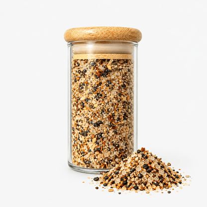 Fleur de Sel Texas Smokey Chipotle Blend – Smoked Chipotle Sea Salt in a glass jar with a wooden lid, showcasing its texture.