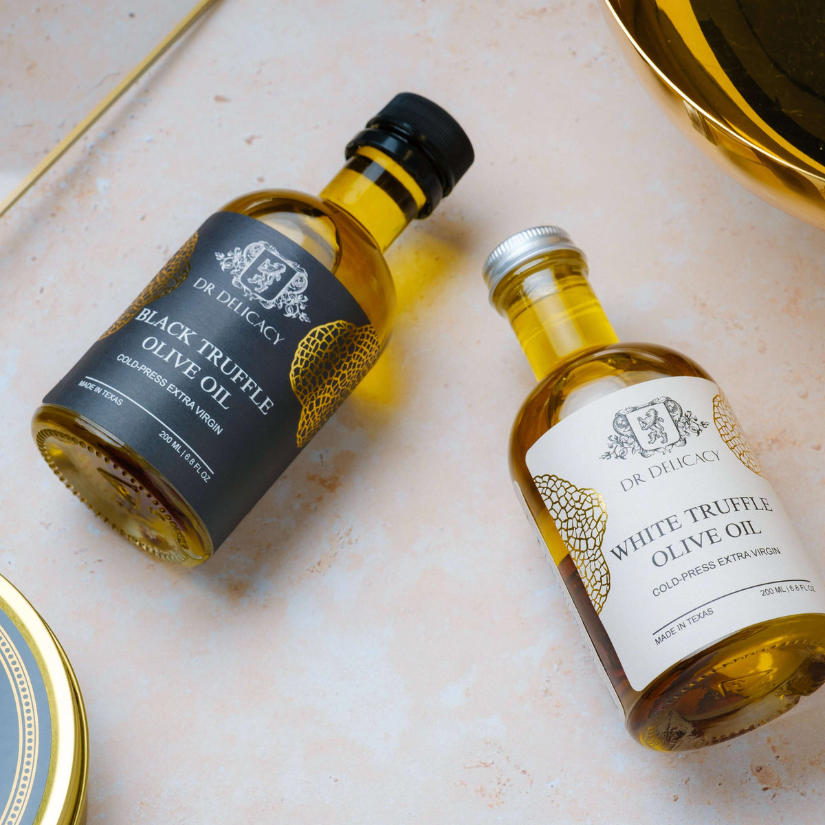 Truffle Extra Virgin Olive Oil bottles from DR Delicacy, showcasing Black and White Truffle Olive Oil varieties.
