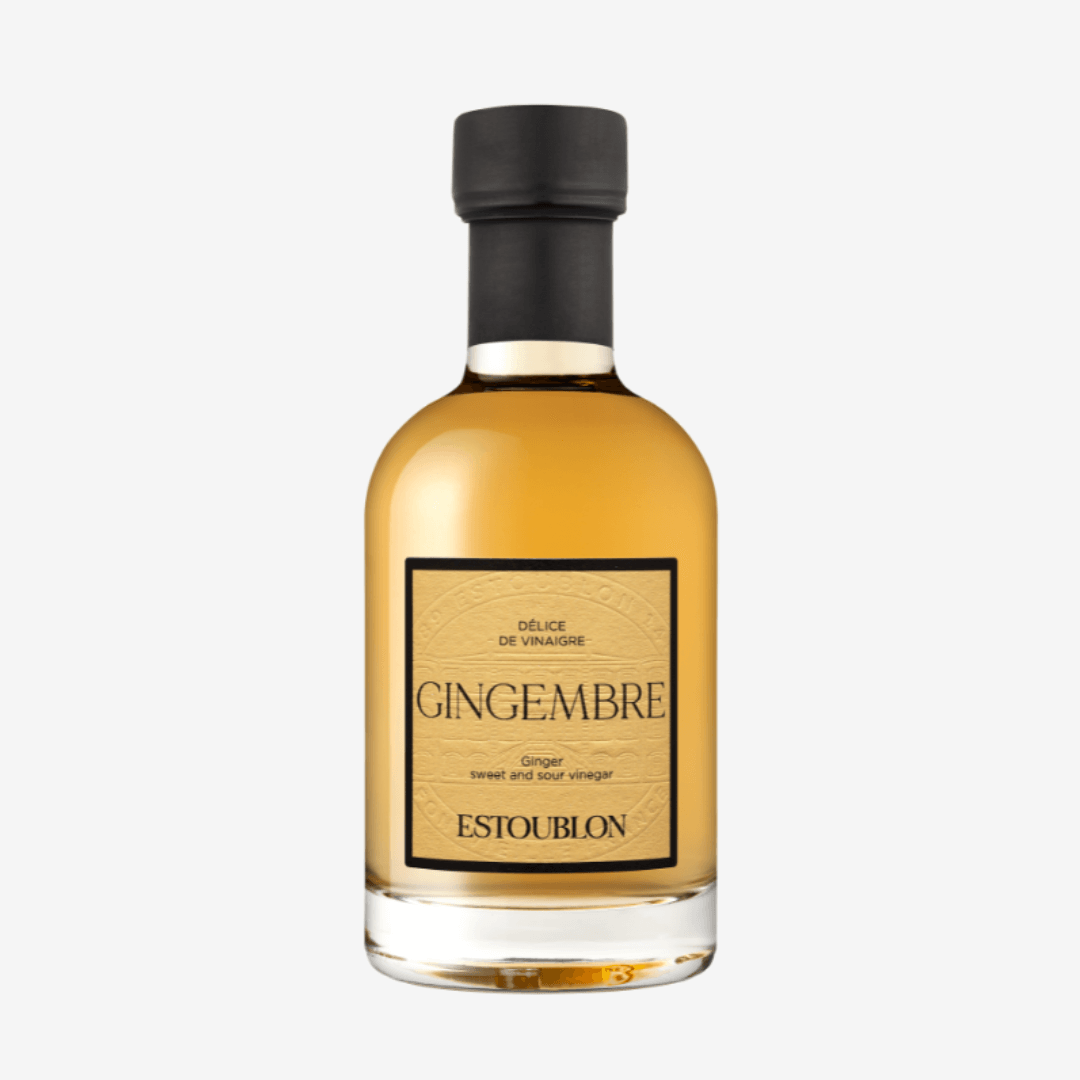 Ginger Wine Vinegar in an elegant glass bottle showcasing the vibrant color and label design.