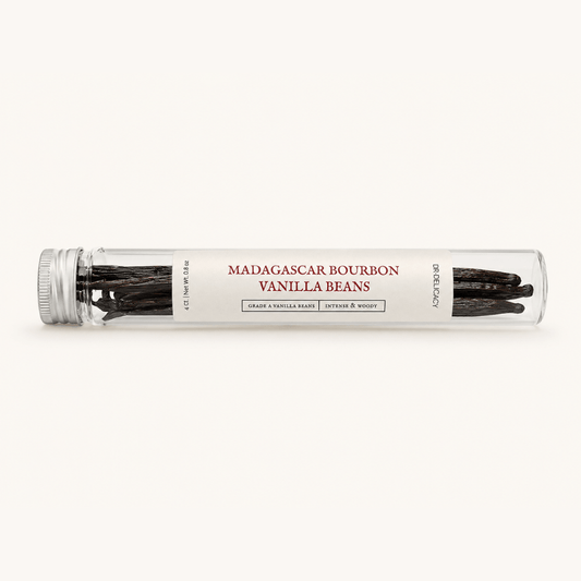 Grade A Madagascar Bourbon Vanilla Beans in a glass jar, showcasing rich, woody aroma and complex flavor.
