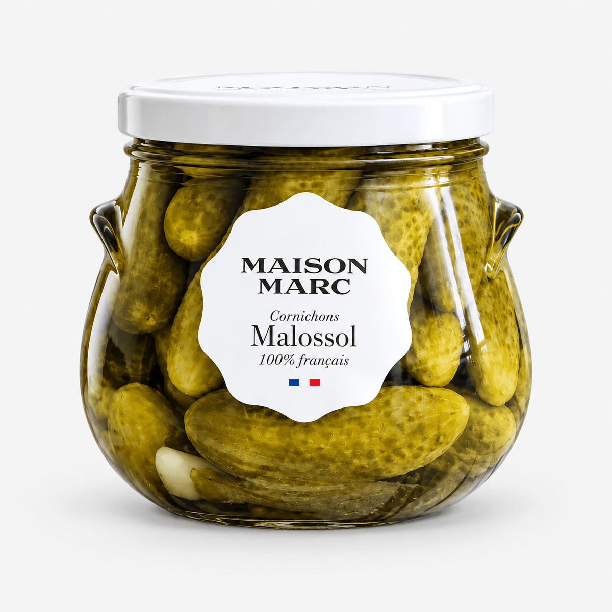 Maison Marc Cornichons Malossols in a jar showcasing fresh, tangy pickles for gourmet meals.