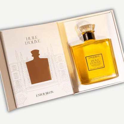 Flacon Couture Grand Cru Olive Oil in elegant packaging showcasing its refined design and rich golden color.