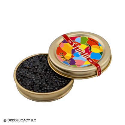 Sturia Siberian Origin Caviar in a gold tin, showcasing jet black pearls and colorful packaging.