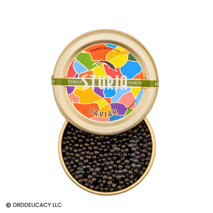 Sturia Siberian Primeur Caviar in a decorative tin showcasing the medium dark amber pearls.
