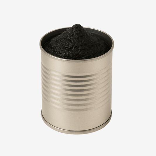 Black Summer Truffle Paste in a metal can, showcasing its rich, dark color and smooth texture.