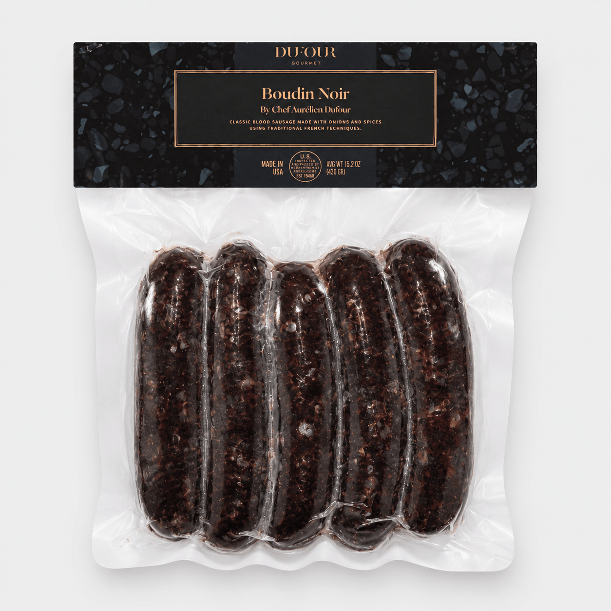 Dufour Boudin Noir Sausage packaged in a vacuum-sealed bag, featuring five links of traditional French blood sausage.
