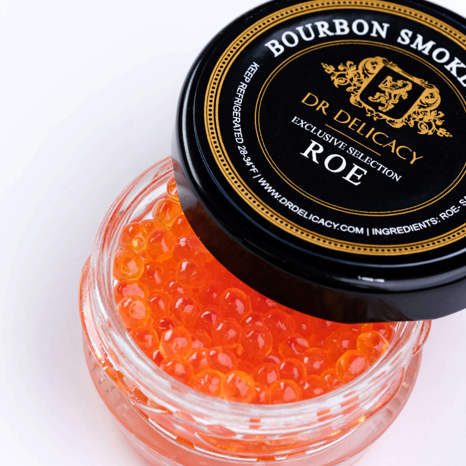 Bourbon smoked roe in a glass jar by Dr. Delicacy, featuring vibrant orange fish eggs.