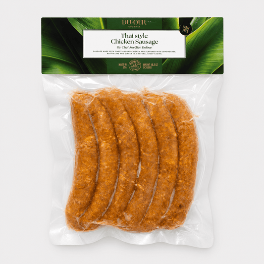 Dufour Thai Chicken Sausage in a clear package showcasing flavorful chicken sausages inspired by Thai cuisine.